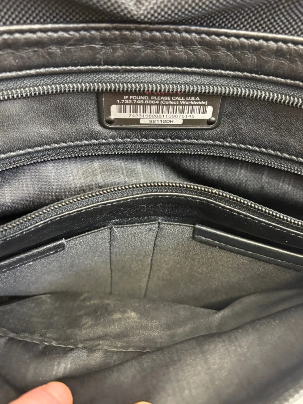 TUMI black leather large messenger bag